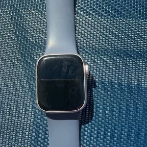Apple Smartwatch with Blue Band and Black Screen